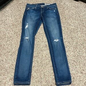 Ag distressed dark rinse skinny jeans